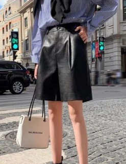 Black Faux Leather Mid-Length Shorts | Soobin - TXT 18 Black Faux Leather Mid-Length Shorts | Soobin - TXT -Amped Apparel Beomgyu TXT Black Faux Leather Belted Cropped Jacket 14 600x781 1