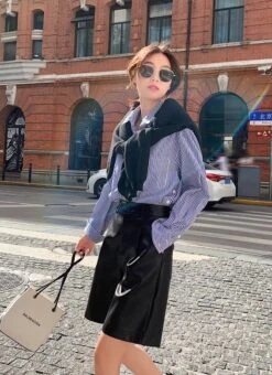 Black Faux Leather Mid-Length Shorts | Soobin - TXT 23 Black Faux Leather Mid-Length Shorts | Soobin - TXT -Amped Apparel Beomgyu TXT Black Faux Leather Belted Cropped Jacket 18