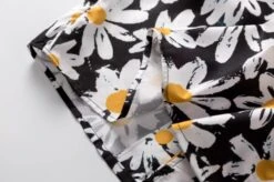 Black Daisy Pattern Shirt | Doyoung - Treasure 20 Black Daisy Pattern Shirt | Doyoung - Treasure -Amped Apparel Black Daisy Pattern Shirt Doyoung Treasure 7 600x399 1