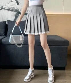 Black Laced School Girl Pleated Skirt | Sullyoon - NMIXX -Amped Apparel Black Laced School Girl Pleated Skirt Sullyoon NMIXX 1 600x705 1