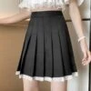 Black Laced School Girl Pleated Skirt | Sullyoon - NMIXX -Amped Apparel Black Laced School Girl Pleated Skirt Sullyoon NMIXX 2 600x657 1
