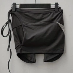 Black Strappy Wrap Skorts | Haerin - NewJeans -Amped Apparel Black Strappy Wrap Skorts Haerin NewJeans 2 600x600 1