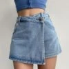 Blue Asymmetrical Denim Skorts | Jennie - BlackPink -Amped Apparel Blue Asymmetrical Denim Skorts Jennie BlackPink 1 600x667 1