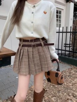 Brown Plaid Pleated Skirt With Double Belt Slots | Wendy - Red Velvet -Amped Apparel Brown Plaid Pleated Skirt With Double Belt Slots Wendy Red Velvet 1 600x799 1