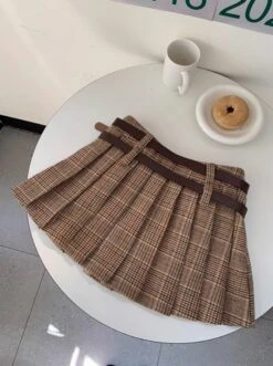 Brown Plaid Pleated Skirt With Double Belt Slots | Wendy - Red Velvet -Amped Apparel Brown Plaid Pleated Skirt With Double Belt Slots Wendy Red Velvet 3 600x803 1