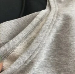 Grey Sleeveless Hoodie | Sunoo - Enhypen -Amped Apparel Grey Sleeveless Hoodie Sunoo Enhypen 2 600x597 1