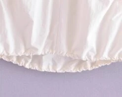 White Drawstring Sleeveless Top | Haerin - NewJeans -Amped Apparel Haerin NewJeans White Drawstring Sleeveless Top 10 600x479 1