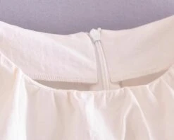 White Drawstring Sleeveless Top | Haerin - NewJeans -Amped Apparel Haerin NewJeans White Drawstring Sleeveless Top 7 600x480 1