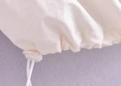 White Drawstring Sleeveless Top | Haerin - NewJeans -Amped Apparel Haerin NewJeans White Drawstring Sleeveless Top 8 600x429 1