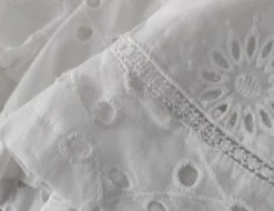 White Cut-Out Embroidery Shirt | Hyunjin - Stray Kids -Amped Apparel Hyunjin Stray Kids White Cut Out Embroidery Shirt 5 600x462 1