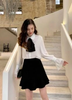 White Bell Sleeve Blouse With Black Bow Tie 25 White Bell Sleeve Blouse With Black Bow Tie -Amped Apparel IU Oversized Bow Tie And Laced Bell Cuffs Shirt 00013 600x837 1