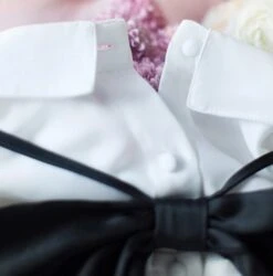 White Bell Sleeve Blouse With Black Bow Tie 40 White Bell Sleeve Blouse With Black Bow Tie -Amped Apparel IU Oversized Bow Tie And Laced Bell Cuffs Shirt 00023 600x607 1