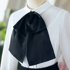 White Bell Sleeve Blouse With Black Bow Tie 36 White Bell Sleeve Blouse With Black Bow Tie -Amped Apparel IU Oversized Bow Tie And Laced Bell Cuffs Shirt 00027 600x602 1