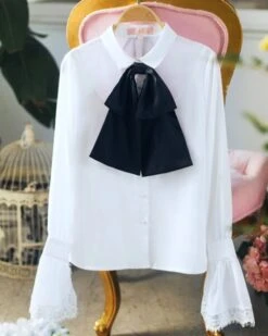 White Bell Sleeve Blouse With Black Bow Tie 37 White Bell Sleeve Blouse With Black Bow Tie -Amped Apparel IU Oversized Bow Tie And Laced Bell Cuffs Shirt