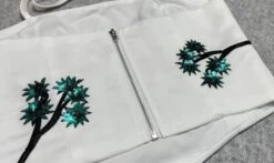 White Sequin Embellished Cropped Halter Top | Jennie - BlackPink -Amped Apparel Jennie BlackPink White Sequin Embellished Cropped Halter Top 2 600x356 1