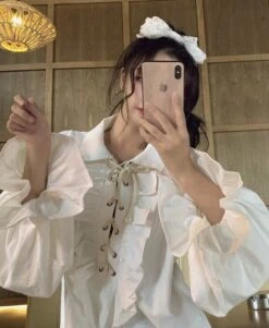 White Ruffled Blouse | Jeongin - Stray Kids -Amped Apparel Jeongin Stray Kids White Ruffled Shirt 12 e1643802359783 600x731 1