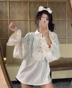 White Ruffled Blouse | Jeongin - Stray Kids -Amped Apparel Jeongin Stray Kids White Ruffled Shirt 23 600x726 1