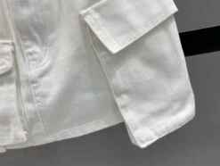 White Denim Skort With Pockets | Lia - ITZY -Amped Apparel Lia ITZY White Denim Skort With Pockets 4 600x451 1