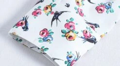 White Shirt With Floral Print | Lisa - BlackPink -Amped Apparel Lisa BlackPink White Shirt With Floral Print 8 600x334 1