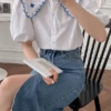 White Embroidered Doll Collar Blouse | Miyeon - (G)I-DLE -Amped Apparel Miyeon GI DLE White Embroidered Doll Collar Blouse 4