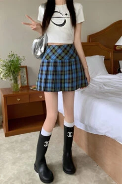 Red Pleated A-Line Plaid Skirt | Sakura - Le Sserafim -Amped Apparel Sakura Le Sserafim Red Pleated A Line Plaid Skirt 10 600x905 1