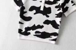 Black And White Cow Pattern Polo Shirt | Soyeon - (G)I-DLE -Amped Apparel Soyeon GI DLE Black And White Cow Pattern Polo Shirt 4 600x397 1