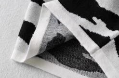 Black And White Cow Pattern Polo Shirt | Soyeon - (G)I-DLE -Amped Apparel Soyeon GI DLE Black And White Cow Pattern Polo Shirt 9 600x394 1