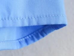 Blue Cropped Button-Up Shirt | SuA - Dreamcatcher -Amped Apparel Sua Dreamcatcher Blue Cropped Button Up Shirt 5 600x451 1