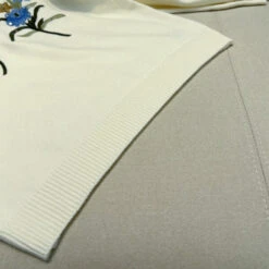 White Flower Embroidered Knitted Sweater | Eunwoo - Astro -Amped Apparel White Flower Embroidered Knitted Sweater Eunwoo Astro 4 600x600 1