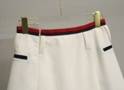 White Irregular Skort With Red And Black Linings | Leeseo - IVE -Amped Apparel White Irregular Skort With Red And Black Linings Leeseo IVE back 2 600x434 1