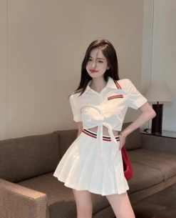 White Pleated Skirt With Red And Blue Banded Waist | Lisa - BlackPink -Amped Apparel White Pleated Skirt With Red And Blue Banded Waist Lisa BlackPink Idol 2 600x741 1