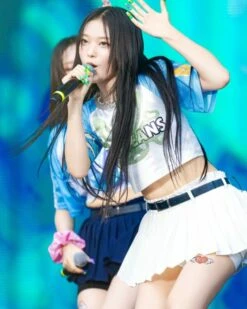 White Protruding Pleated Skorts | Haerin - NewJeans -Amped Apparel White Protruding Pleated Skorts Haerin NewJeans Idol 1 scaled 600x750 1