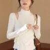 White Two-Piece Illusion Mock Neck Wrap Top | Wonyoung - IVE -Amped Apparel White Two Piece Illusion Mock Neck Wrap Top Wonyoung IVE 3 600x812 1
